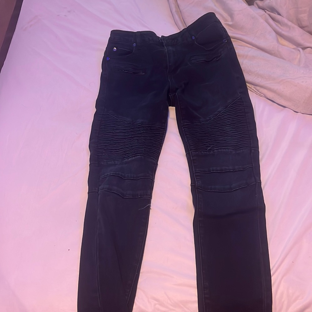 black jeans never worn before dont fit me , have lines and zippers in the front